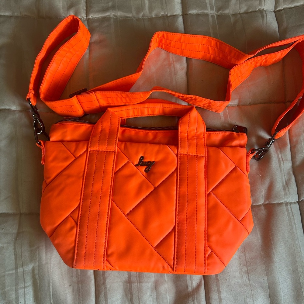 Lug Quilted Crossbody Bag in Bright Orange.